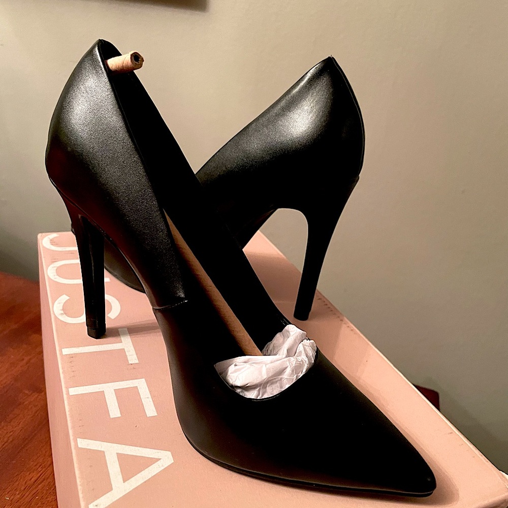 Women’s black stiletto heels. NIB never worn.